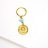 fair-trade human trafficking peso keychain