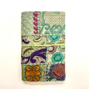fair-trade human trafficking green patchwork journal